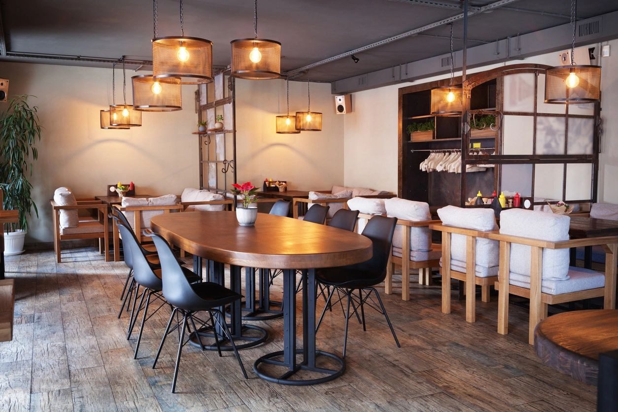 A restaurant with tables and chairs in it