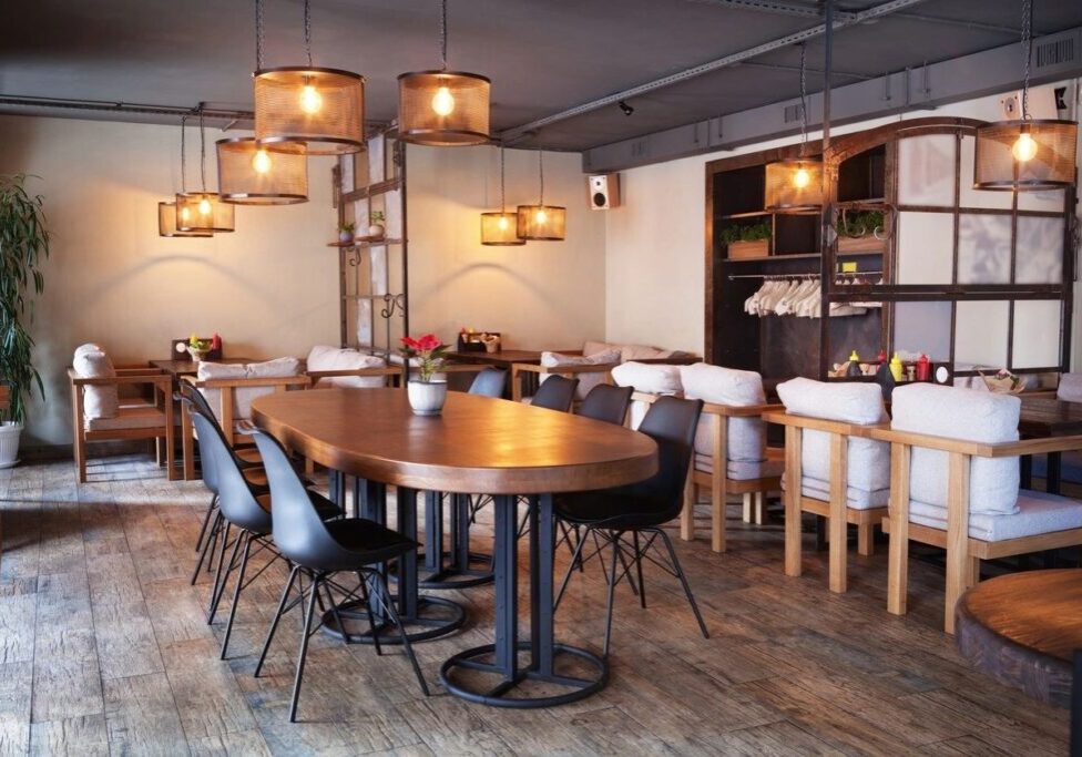 A restaurant with tables and chairs in it