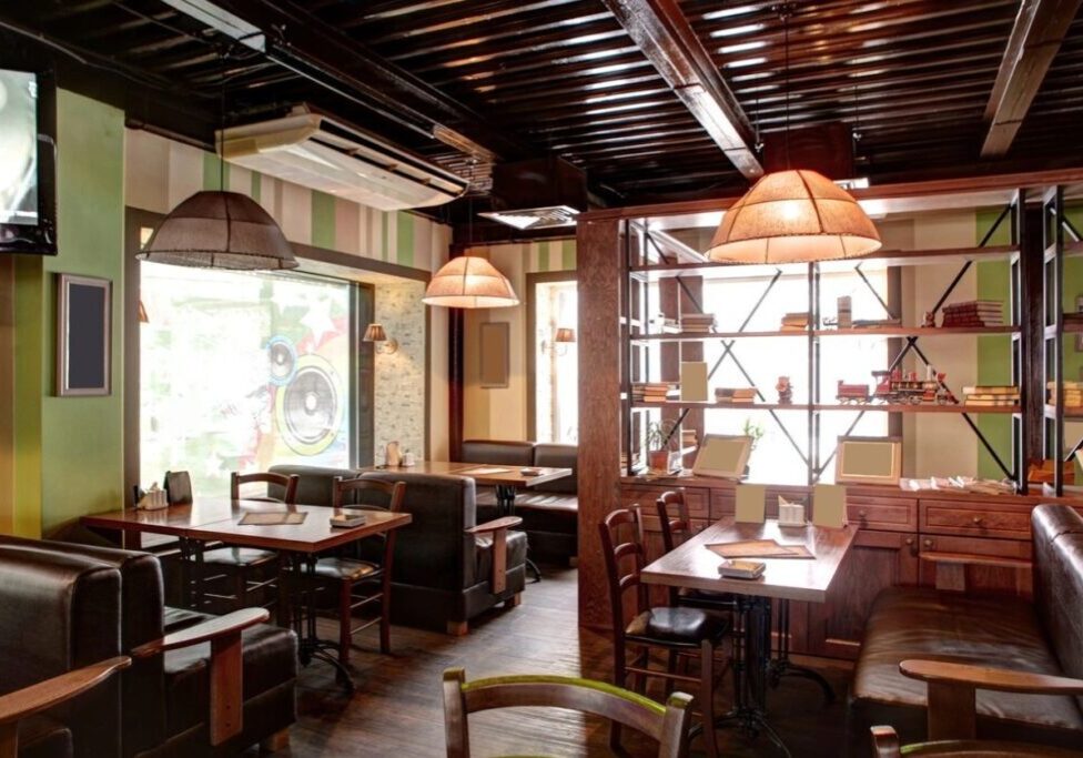 A restaurant with tables and chairs in it